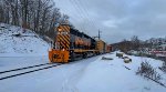 WE 105 leads the train at Gilchrist Rd.